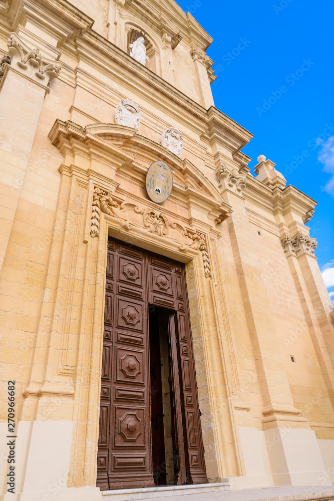 Wooden door entrance to the Citadella Citadel Cathedral, Victoria, Gozo, Malta.