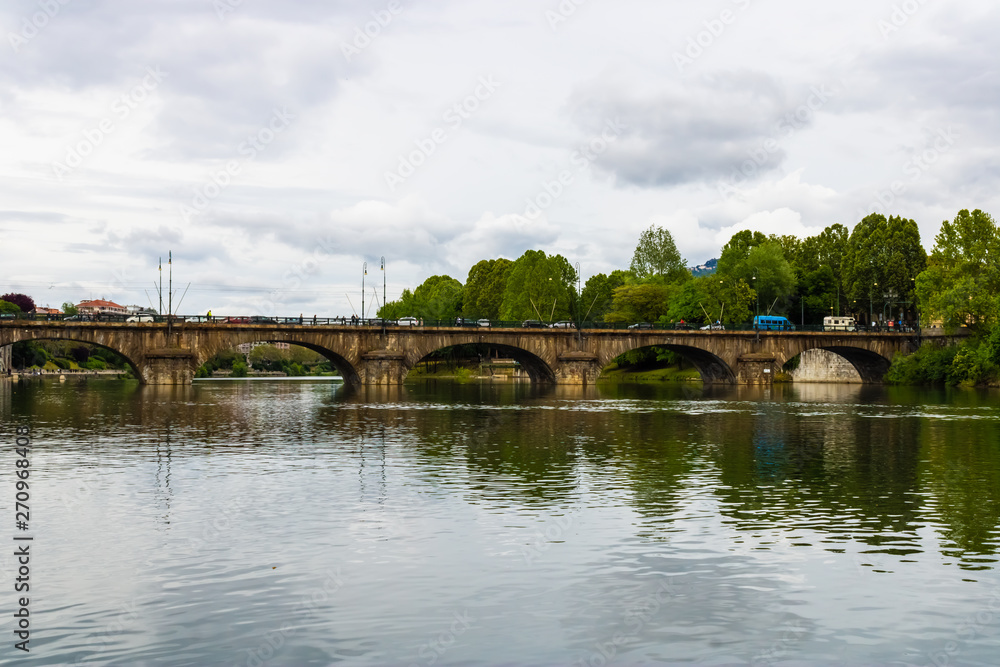 Fototapeta premium View at Po river, park and Bridge Umberto I in Turin, Italy - Image