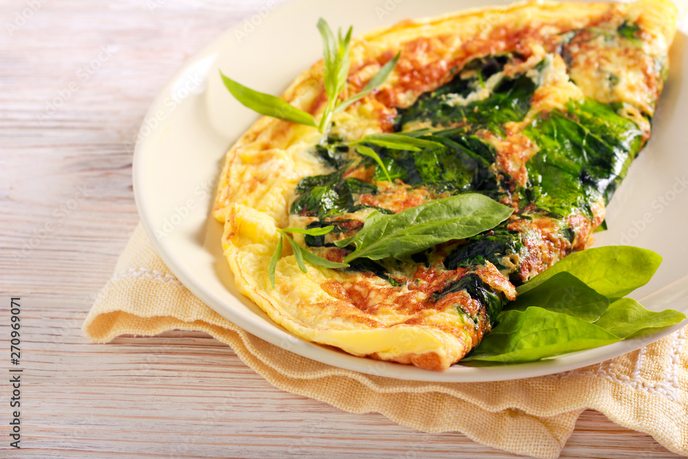Spinach and tarragon omelet served