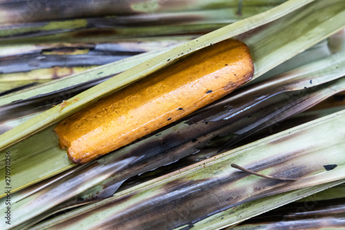 Otak otak, food with fish wrapped in leaf and grilled. photo