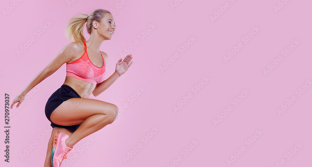 Young powerful beautiful runner fit girl studio portrait. Weight Loss. Healthy lifestyle. Sporty healthy fitness woman in action - obrazy, fototapety, plakaty 
