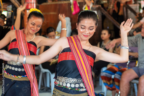 Beautiful young girls from Kota Belud Kadazan Dusun ethnic performed traditional dance during state level Harvest Festival in KDCA, Kota Kinabalu, Sabah Malaysia.