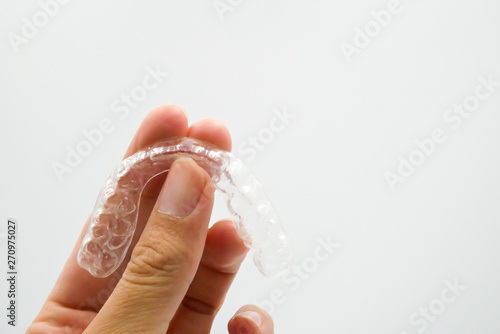 Clear plastic retainer teeth, it's a new technology equipment for orthodontist give the patient to orthodontic surgery in dental clinic or hospital