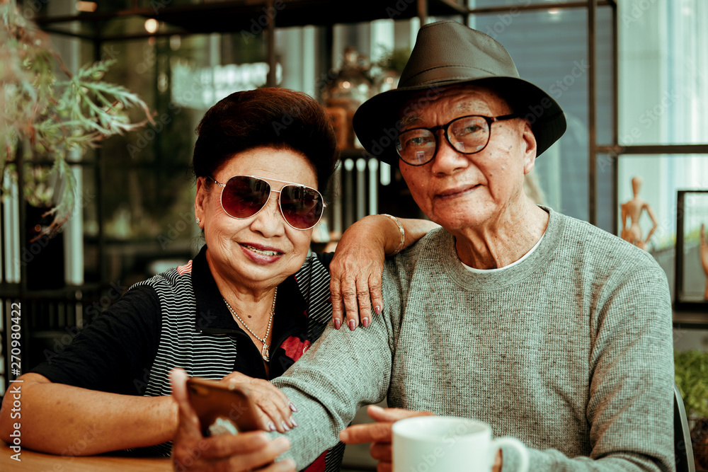 Asian senoir old man retirement drinking coffee in cafe smile and happy face Asian senoir old man retirement drinking coffee in cafe smile and happy face