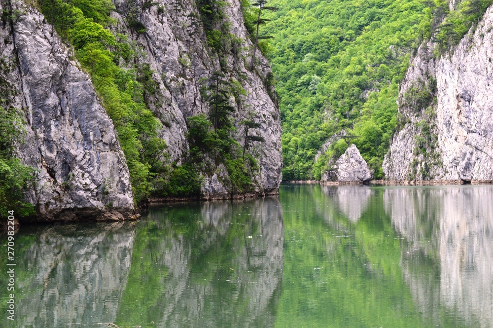 Reflection of the stone in the lake