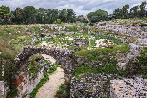 Ruins of Roman Amphitheater in Neapolis Archaeological Park in Syracuse, Sicily Island of Italy