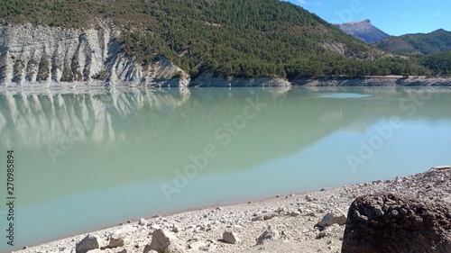 turquoise lake in the mountains in the alps