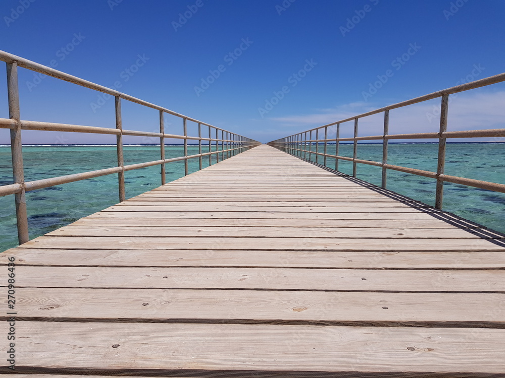wooden pier against the sky