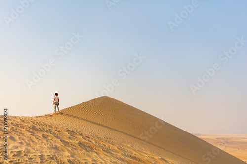 Little girl having fun at desert