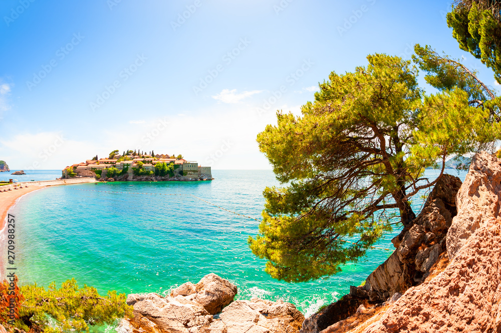 Sveti Stefan island near Budva, Montenegro. Beautiful summer landscape. Famous travel destination.