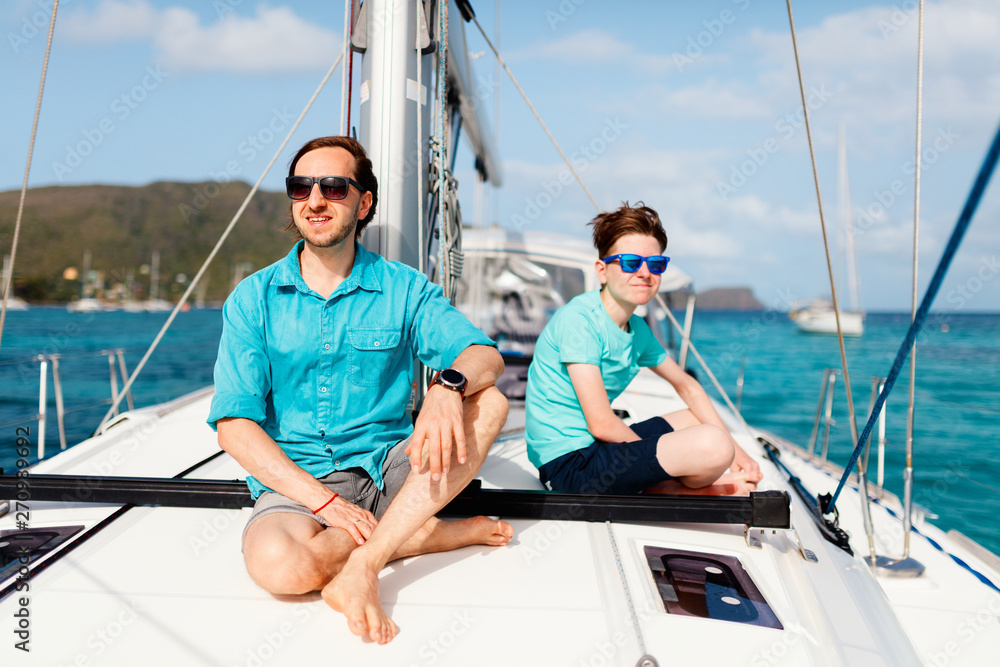Family on board of sailing yacht Family on board of sailing yacht