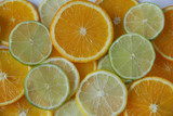 Flat lay. Top view. Orange, lime, lemon. Citrus fruit slices pattern, texture, background. Healthy food, detox, diet. Food pattern.