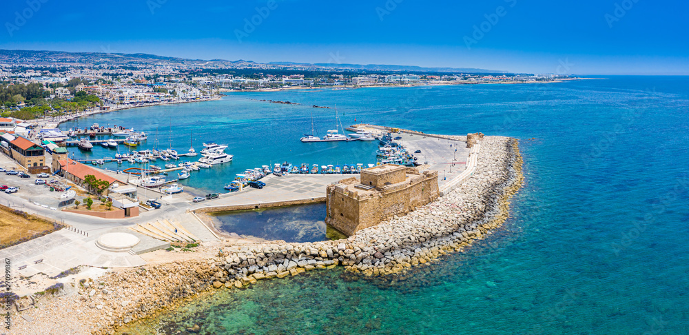 Cyprus. Pathos. The Paphos castl panoramic view from the sea. The medieval port castle in the harbour. The museums of Cyprus. Mediterranean coast. Tourist landmarks Paphos. Travel to Cyprus.