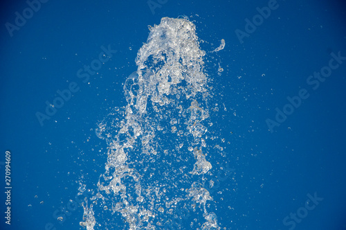 water splash on blue background © Оксана Юлова