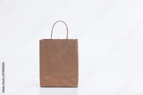 Empty recycle brown gift bag isolated on white background