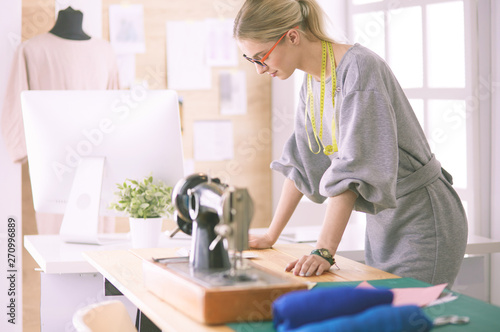 Fashion designer woman working in the studio