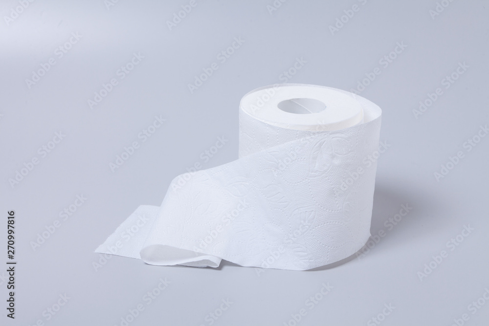 Toilet paper roll isolated on gray background Toilet paper roll isolated on gray background