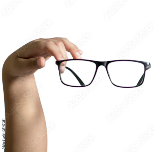Eye glasses in the hand and holding with fingers