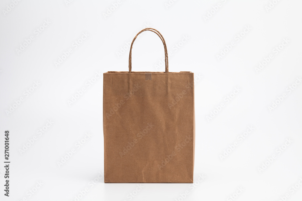 Empty Brown kraft shopping bag stand isolated on white background Empty Brown kraft shopping bag stand isolated on white background