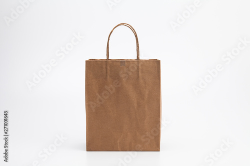 Empty Brown kraft shopping bag stand isolated on white background 