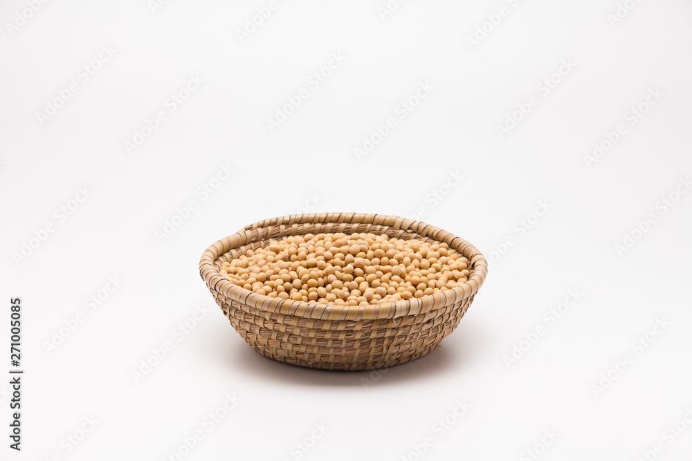 Soybeans in basket isolated on white background