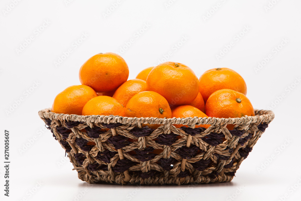 Ornage in basket isolated on white background Mandarin Ornage in basket isolated on white background Mandarin