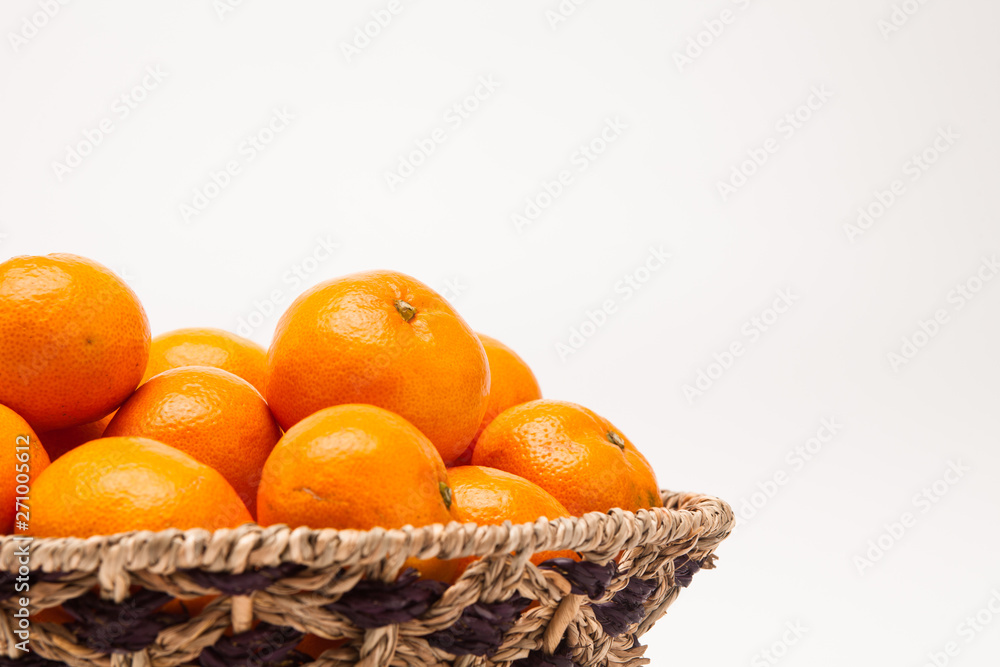 Ornage in basket isolated on white background Mandarin Ornage in basket isolated on white background Mandarin