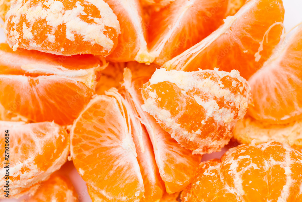 Peeled mandarin oranges on white background Peeled mandarin oranges on white background