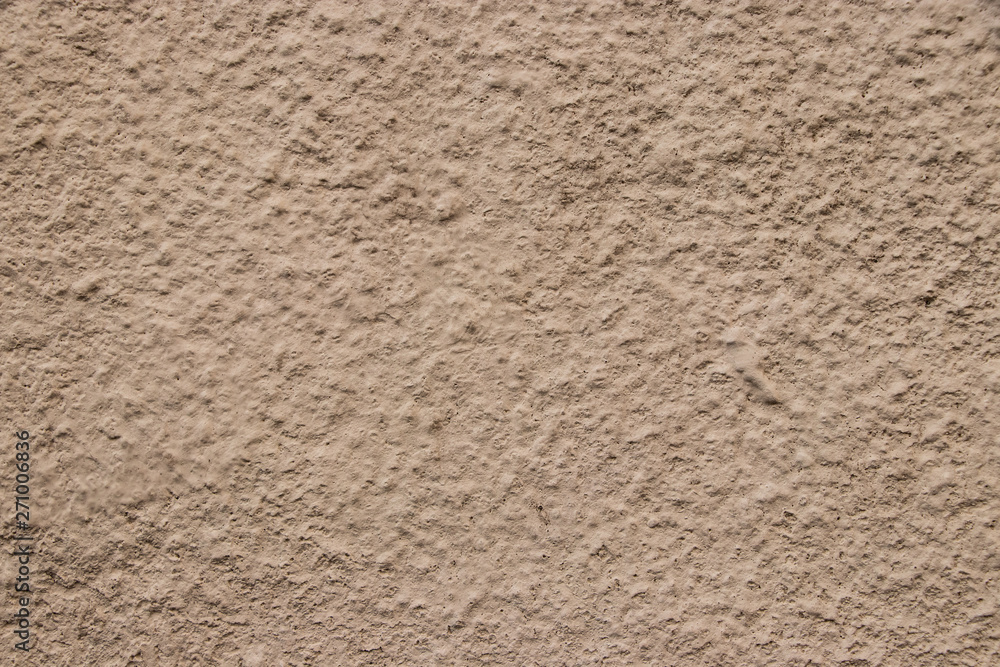 Beige stucco wall texture wide shot Beige stucco wall texture wide shot