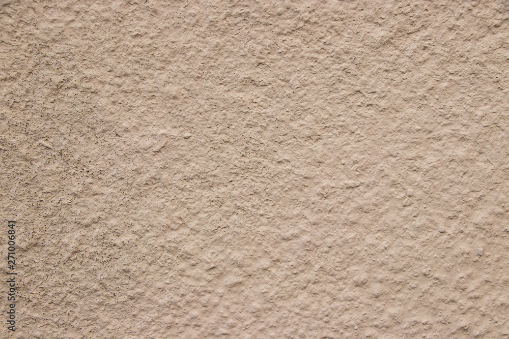 Beige stucco wall texture wide shot Beige stucco wall texture wide shot