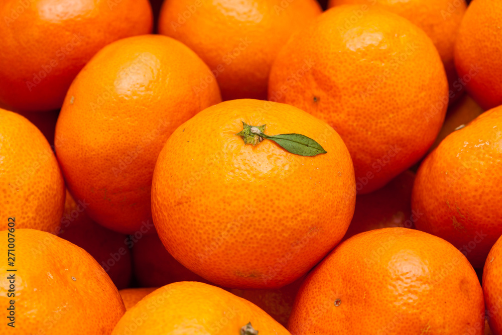 Close up of pile of fresh juicy mandarin oranges Close up of pile of fresh juicy mandarin oranges