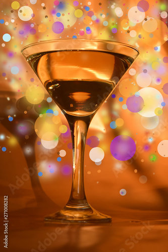 wineglass with festive background