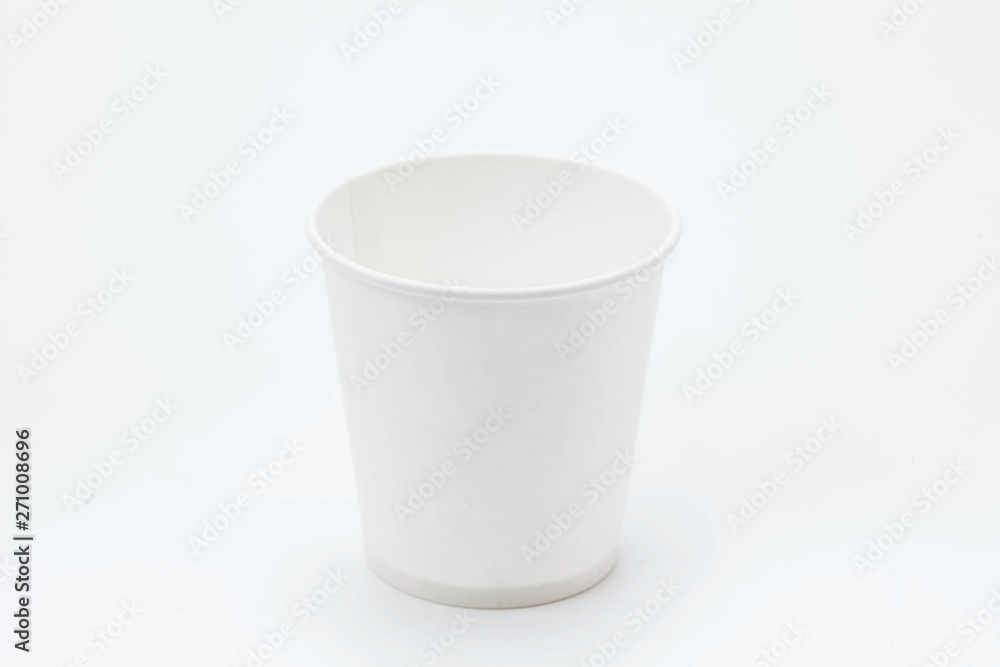 White paper cup and cups on white backbround White paper cup and cups on white backbround