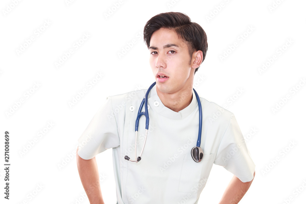 疲れた表情の医師 疲れた表情の医師