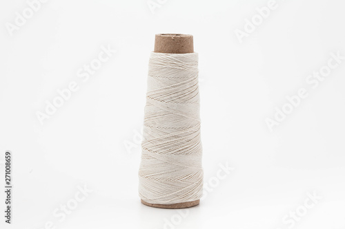 A spool of thread isolated on white background 