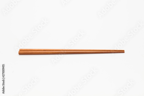 Wooden chopsticks isolated on white background
