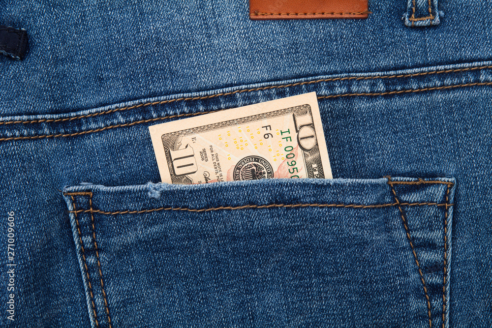 Ten 10 dollar in the back pocket of blue jeans Ten 10 dollar in the back pocket of blue jeans