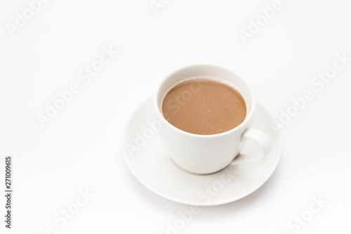 Coffee cup on saucer on white background