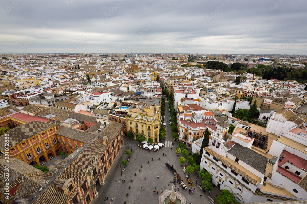 View east with Archbishops palace at Plaza Virgen de los Reyes from Seville Cathedral Giralda