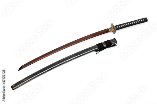 Red blade Japanese sword black cord with shiny ray skin wrapped scabbard isolated in white background.