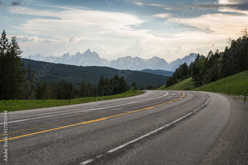 Road leading to the mountains, tetons, wyoming