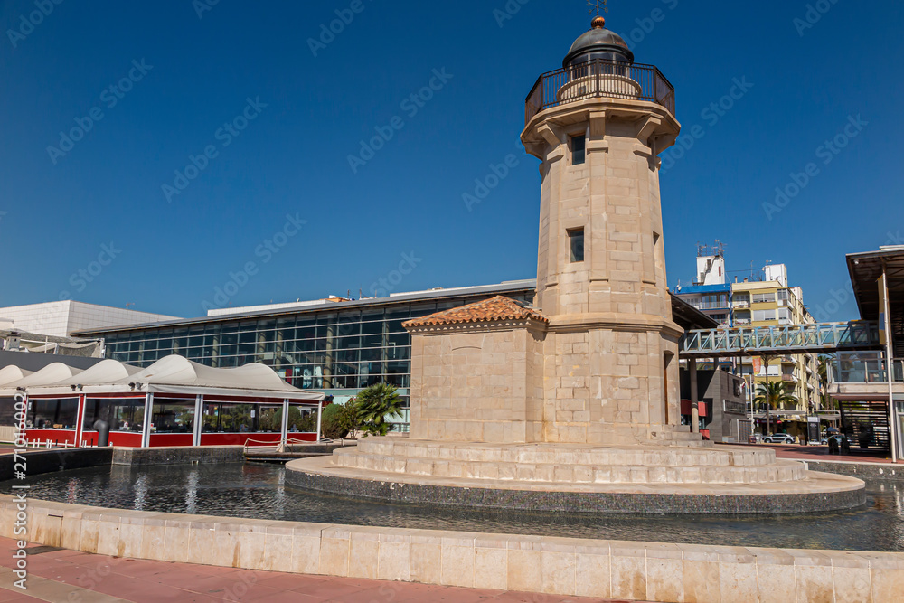 horizontal view of the lighthouse in the port of castellon de la plana in the province of castellon, valencian community, spain on a summer day