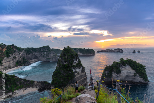 Early morning sunrise with Vew of cliff Nusa Penida Island, Bali, Indonesia. Azure beach, rocky mountains in ocean