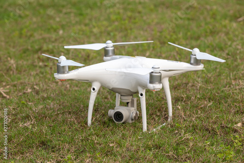 The View of a White Aerial Photographic UAV In the Air.