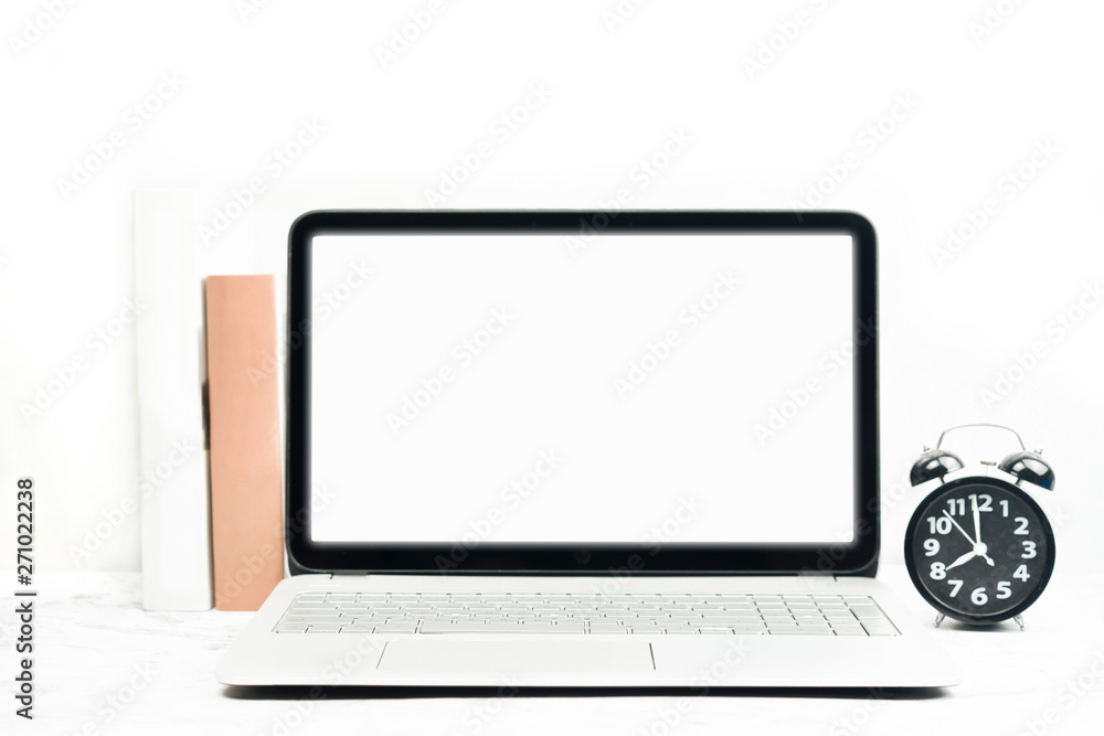 Mock up screen on laptop and alarm clock with white background Mock up screen on laptop and alarm clock with white background