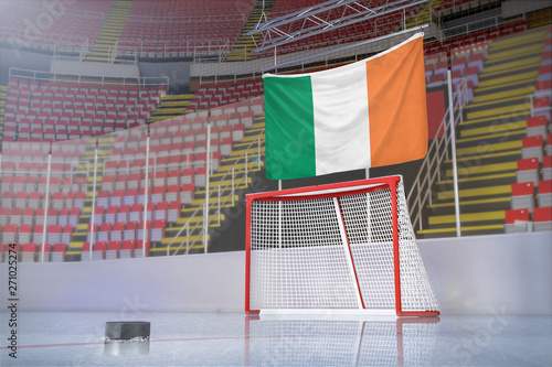 Flag of Ireland in hockey arena with puck and net