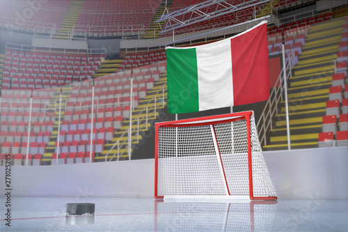 Flag of Italy in hockey arena with puck and net