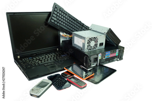 Electronic waste, gadgets electronic equipment for daily use, Laptop and Desktop computer and cell phones isolated on white background