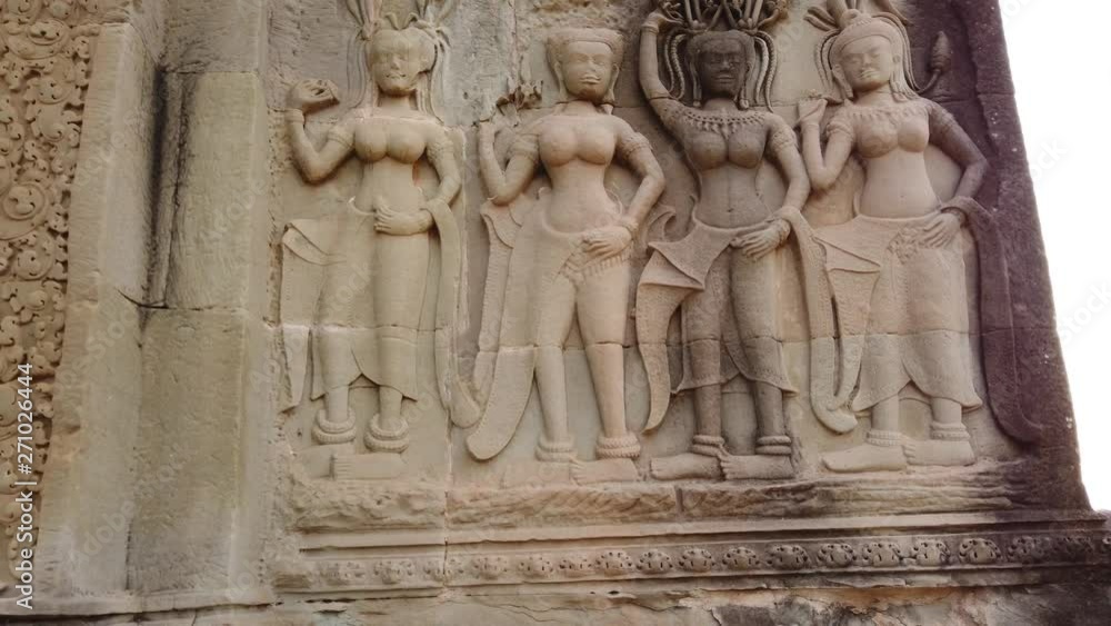 Apsara Divine Dancer Carved On Stone Wall in Angkor Wat Cambodia. Siem Reap, Cambodia. Apsara Divine Dancer Carved On Stone Wall in Angkor Wat Cambodia. Siem Reap, Cambodia.