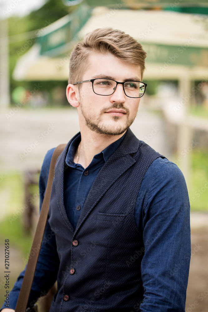 Obraz premium portrait of a young man with a bag